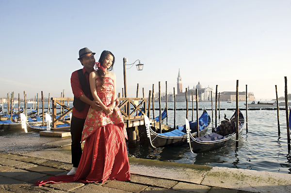 the happy couple standing on the waterfront - wedding photo by top Rome based destination wedding photographer Rochelle Cheever, Rome Weddings Photography